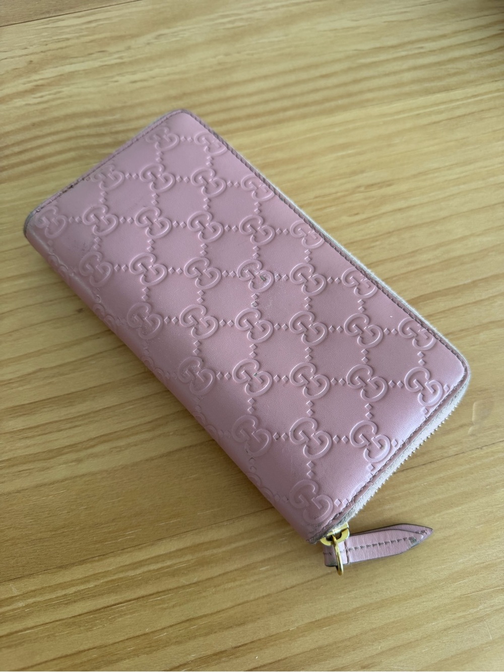 Gucci Pink Embossed GG Zip-Around Leather Wallet